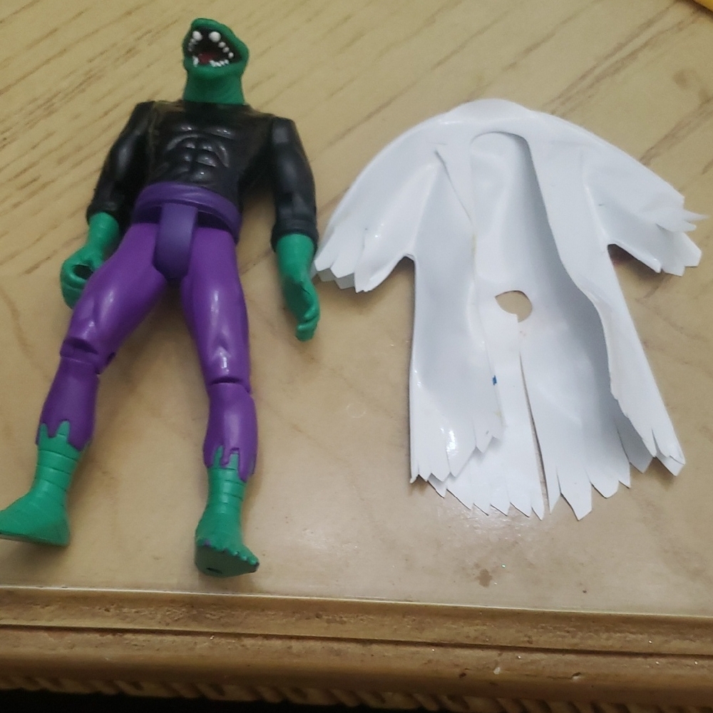 Green and Purple Action Figure with White Cape